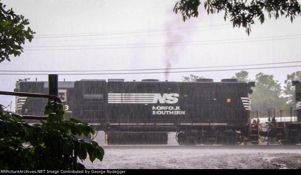 NS 3203 in a heavy thunderstorm at the Hayne Yard